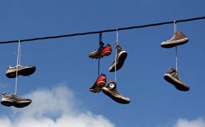 Shoe Tossing, Shoefiti……Why do those shoes hang from Power Lines ... Shoes Hanging On Power Lines Tattoo, Converse Hanging From Power Lines, Shoes Hanging From Power Lines, Shoes Hanging On Power Lines, Shoes On A Wire, Brazil Vibes, Shoes Hanging, True Vine, Hanging Shoes