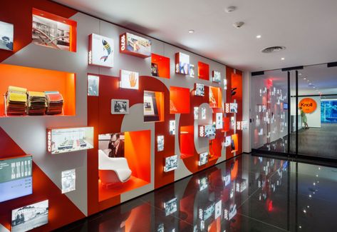 Signs of Life - Core77 Wall Display Ideas, Award Display, History Wall, Thrift Store Furniture, Workspace Design, Wall Graphics, Design Museum, Corporate Design, Colorful Furniture