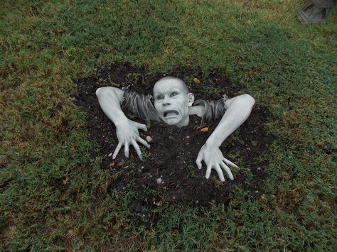 Our zombie from the Tuscano catalog. Add some topsoil to make it look like he is really rising from the grave. Top Soil, Halloween Fun, Zombie, Garden Sculpture, Halloween Decorations, Make It, Halloween, Outdoor Decor, Quick Saves