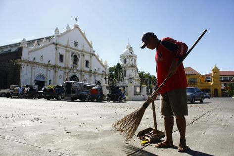 Street Sweeper. A photo of a street sweeper cleaning the church grounds in Vigan , #sponsored, #street, #sweeper, #cleaning, #Street, #Sweeper #ad Vigan City Philippines, Vigan Ilocos Sur, Vigan City, Ilocos Region, Ilocos Sur, Street Sweeper, Adventure Club, Spanish Architecture, Vigan