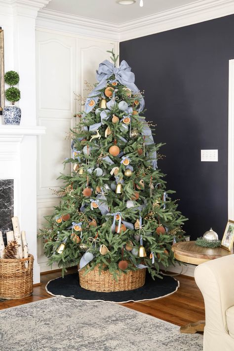 Orange, Blue & Brown Christmas Tree Ideas You’ll Love Navy Blue Farmhouse Christmas Tree, Green Blue Brown Christmas Tree, Slate Blue Christmas Tree, Blue And Orange Christmas Decor, Orange And Blue Christmas Tree, Brown Christmas Tree Ideas, Blue And Brown Christmas Tree, Blue And Orange Christmas, Blue And Brown Christmas