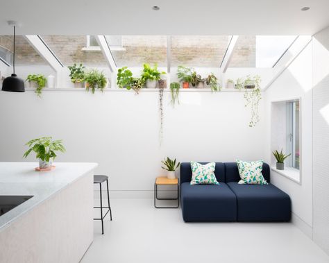 CAN adds blue and white striped extension to London house Victorian Terrace House Extension, Terrace House Extension, London Terrace House, Douglas House, Resin Floor, White Mosaic Tiles, Victorian Terrace House, Blue Patio, Desain Pantry