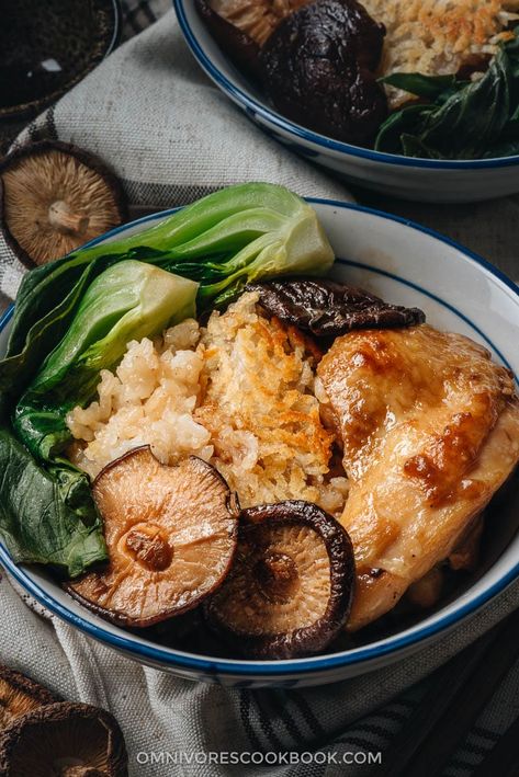 Clay Pot Chicken Rice - This clay pot chicken rice is so addictive! Beyond the greatness of the tender and moist chicken, the rice absorbs all the extract from the mushrooms and chicken grease, and is then seasoned with oyster sauce. It is SO good! My recipe teaches you the easiest way to create a super flavorful one-pot dinner without a clay pot or rice cooker. Clay Pot Chicken, Chicken Pieces Recipes, Clay Pot Cooking Recipes, Claypot Chicken Rice, Chicken Rice Recipes, Cantonese Food, Cantonese Cuisine, Chinese Cooking, Chicken Rice