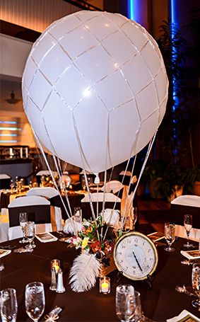 Steampunk inspired hot air balloon centerpiece at Walt Disney World wedding reception Steampunk Hot Air Balloon Diy, Steampunk Centerpiece, Steampunk Wedding Ideas, Steampunk Party Decorations, Steampunk Wedding Decorations, Balloon Aesthetic, Steampunk Wedding Themes, Hot Air Balloon Centerpiece, Air Balloon Centerpiece