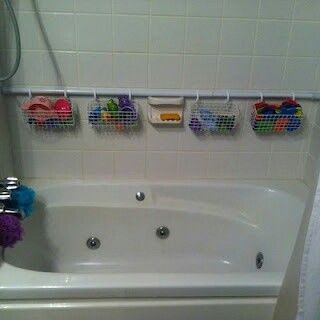 Add an extra shower rod and hang wire baskets with shower curtain rings to the rod. great way to keep toys out of the tub :) Bathtub Toy Storage, Tub Toys, Bathtub Toys, Dollar Store Hacks, Chur, Shower Rod, Shower Curtain Rods, Frugal Tips, Wire Baskets