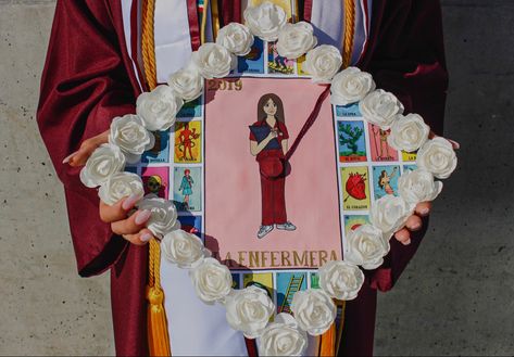 Custom grad cap with loteria “La Enfermera” card painted with acrylic and paper flowers Grad Cap Design, Grad Cap, Cap Design, Paper Flowers, Flowers, Design