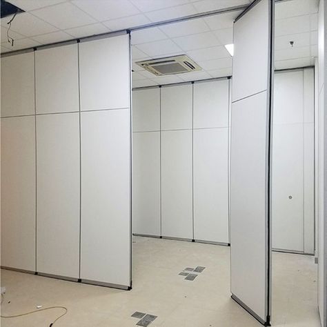 The folding soundproof wall is a series of ceiling mounted moveable partition but also sound insulation. #soundproofpartition #roompartition #partitionwall #partitiondoor #door #wall #panel #divider #division #officepartition #foldingwall #aluminumalloy #officedesign #officefitout #interiordesigners #contracting #consulting #building #architecture #furniture #moderndesign Wall Panel Divider, Moveable Partition Wall, Office Partition Design, Moveable Partition, Soundproof Wall, Folding Partition, Movable Partition, Wardrobe Wall, Panel Divider