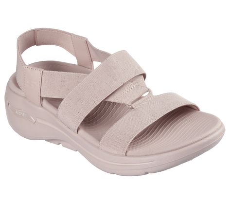 Add some subtle shine to your day with Skechers GO WALK Arch Fit Sandal - Pleasant. This casual sport sandal features a strappy metallic gore upper with lightweight ULTRA GO cushioning, high-rebound Comfort Pillar technology, and a contoured Goga Mat footbed with podiatrist-certified Arch Fit support. | Skechers Women's GO WALK Arch Fit Sandal - Pleasant Sandals | Medium Width | Patented Skechers Arch Fit contoured footbed with podiatrist-certified arch support | Podiatrist-designed shape developed with 20 years of data and 120, 000 unweighted foot scans | Contoured footbed helps mold to your foot to reduce shock and increase weight dispersion | Lightweight, responsive ULTRA GO cushioning | Contoured Goga Mat comfort footbed | High-rebound Comfort Pillars for added support | Crafted with 1 Womens Walking Sandals, Skechers Go Walk, Ladies Sandals, Sandals Flat, Walking Sandals, Support Design, Casual Sport, Skechers Women, Sport Sandals