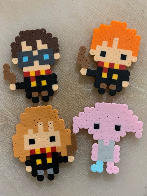 Harry Potter, Ron Wesley, Hermione Granger, and Dobby Harry Potter Iron Beads, Harry Potter Fuse Beads, Iron Beads Harry Potter, Harry Potter Melty Beads, Perler Bead Harry Potter, Harry Potter Beads, Harry Potter Hama Beads Pattern, Hama Beads Harry Potter, Hama Beads Patterns Harry Potter