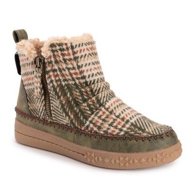 Plush & warm, MUK LUKS? Women's Street Richmond Booties blend luxe comfort with fashionable style. This sweet ankle bootie keeps feet comfortable with memory foam insoles while a flash of modern flare gives a twist on a classic bootie. Wipe with a damp cloth to clean, no bleach, lay flat to dry. Imported. - Zip up closure - TPR Sole - 100% Microfiber Upper - 100% Polyester Lining - 100% Polyester Insole - Memory Foam Insole - Multiple Color Options - Women?s Whole and Half Sizes 6-11 Women's Ankle Boots, Closed Toe Shoes, Women Street, Shoe Insoles, Ankle Bootie, Womens Ankle Boots, Multiple Color, Black Booties, Boot Shoes Women