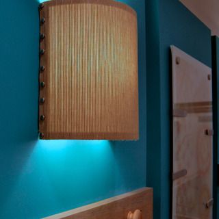 Great DIY wall sconce for those unsightly light bulbs that just stick out of the wall. Of course with different paper. Creating An Entryway, Creative Lamp Shades, Wood Lamp Shade, Wall Lamp Shades, Antique Lamp Shades, Make A Lamp, Rustic Lamp Shades, Wall Scones, Diy Shades