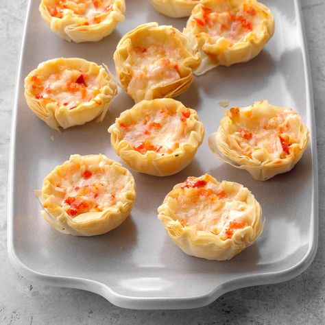 I love lobster, so I created this lobster tart recipe. They are the perfect appetizer for a cocktail party or family dinner. Top with chives or green onions for color. —Lorraine Caland, Shuniah, Ontario Appetizer Tarts, Holiday Snacks Appetizers, Xmas Apps, Lobster Appetizers, Crab Casserole, One Bite Appetizers, Tartlets Recipe, Easter Appetizers, How To Cook Lobster