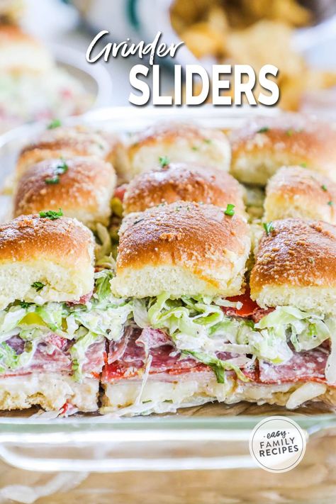 The ultimate flavor-packed delight: Italian Grinder Sliders! These adorable bite-sized versions of the classic grinder sandwich have layers of deli meats, ooey-gooey melted cheese, and an irresistible savory glaze. Trust me, these sliders are like a flavor explosion in every bite! Whether you're hosting a party, looking for a quick and tasty dinner option, or simply want to treat yourself to something scrumptious, these Italian Grinder Sliders are here to satisfy your cravings. Italian Grinder Sliders, Grinder Sliders, Italian Grinder, Grinder Sandwich, Dinner Party Dishes, Slider Sandwiches, Tasty Dinner, Deli Meats, Easy Chicken Dinner Recipes