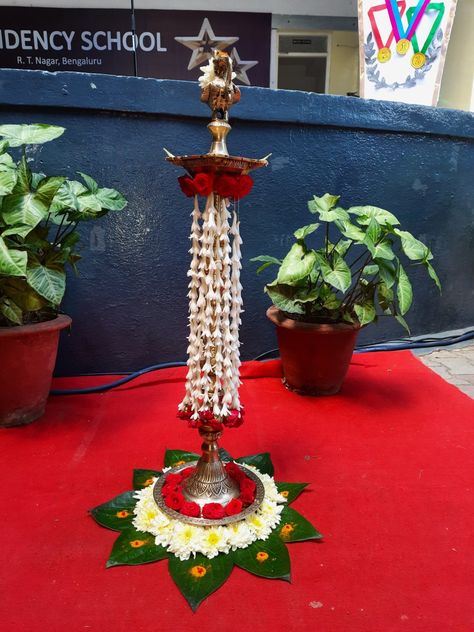 Lamp decoration Kuthu Vilaku Decoration With Flowers, Lamp Decoration Ideas For Pooja, Kuthuvilaku Flower Decoration, Kuthu Vilaku Decoration, Vilakku Decoration, Vilaku Decoration, Poojai Arai, Diyas Decoration, Door Toran