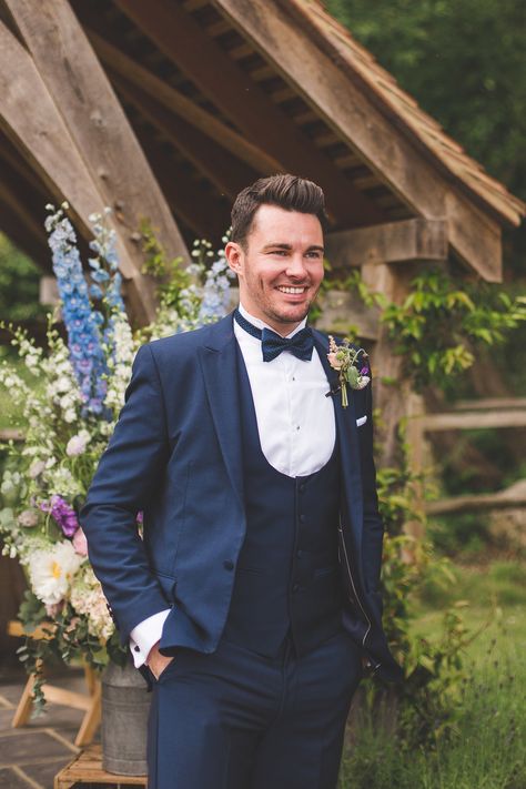 Groom In Navy Three Piece Suit With Bow Tie | Kirsty Mackenzie Photography Navy Three Piece Suit Groom, Navy Suit Bow Tie, Best Wedding Suits For Groom, Navy Three Piece Suit, Suit With Bow Tie, Outside Ceremony, Best Wedding Suits, Velvet Dinner Jacket, Groom Suit Grey