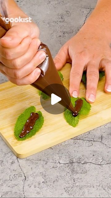 Cookist Wow on Instagram: "If you have some #peppermint leaves and dark #chocolate, you’ll make a super cute and unique decoration for your cakes and desserts 😍🍫🍃

👉METHOD
1. Pour chocolate on a mint leaf, spread with a spoon to cover the entire leaf.
2. Let set and use to decorate.

Did you like thee result? What other chocolate ideas would you like to see? 😋👇

#cookistwow #cookistrecipe #chocolate #decorations #easy #quick #yummy" Chocolate Leaf, Cookist Wow, Chocolate Ideas, Baking Hacks, Chocolate Spoons, Mint Leaf, Cakes And Desserts, Peppermint Leaves, Unique Decoration