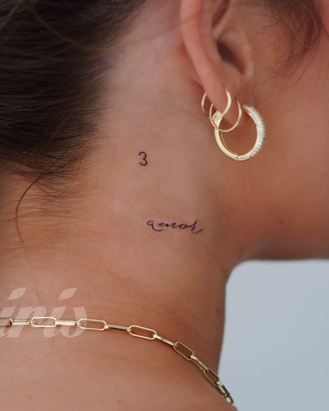 Neck tattoo, tiny tattoo, dainty, delicate, angel numbers, love, amor, luck Amor Tattoo Behind Ear, Amor Neck Tattoo, Angel Tattoo Dainty, Angel Neck Tattoos Women, Mon Amour Tattoo, Love Neck Tattoo, Dainty Angel Tattoo, Amor Tattoo Fonts Words, Amore Tattoo Fonts