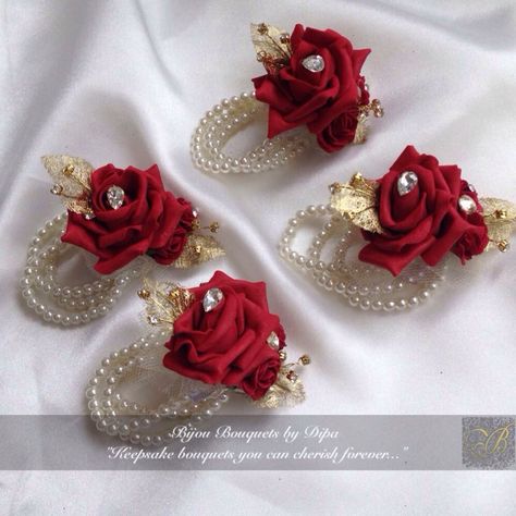 Red and gold corsages for four pretty girls ! Red Boutineer Ideas, Red And Gold Corsage, Anenome Flower, Diy Wrist Corsage, Flowers At Wedding, Red Corsages, Pearl Corsage, Gold Corsage, Beauty And The Beast Wedding Theme