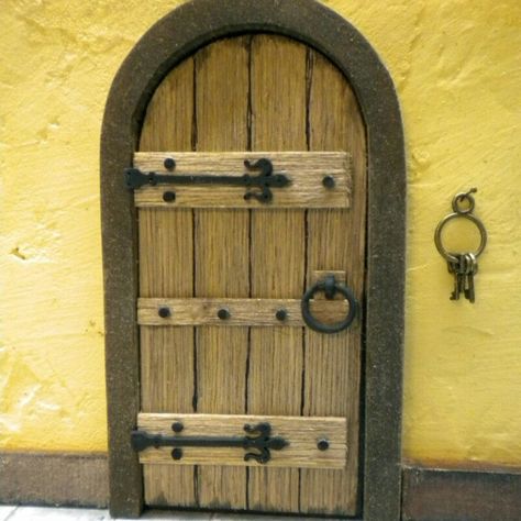 Browse unique items from FirecraftMiniatures on Etsy, a global marketplace of handmade, vintage and creative goods. Miniature Doors, Medieval Cottage, Medieval Door, Warhammer Quest, Cottage Fairy, Castle Doors, Fairy Garden Doors, Medieval Decor, Old Wooden Doors