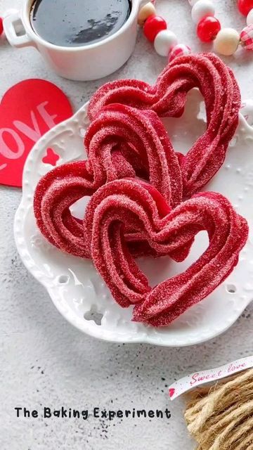 Jean Yap on Instagram: "Red velvet baked churros - less messy than frying 😅 Also tinted the cinnamon sugar using red glitter (I think I first saw this technique when @loveisbakeable tried it) #bakedchurros #bakednotfried #churros #redvelvet #valentinesdaydessert #valentinesdaytreats #redvelvetchurros #buzzfeedtasty #foodfluffer" Red Velvet Churros, Pink Churros, Churro Photography, Christmas Churros, Red Foods For Color Party, Red Velvet Food, Churros Aesthetic, Desserts Red Velvet, Red Party Ideas