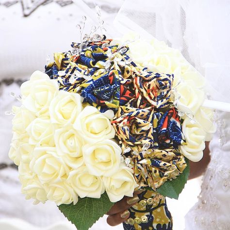 My ever loving ankara brides bouquet! This was handmade for me by a lady in Ghana who is just starting her business in wedding decorations! This lady is very creative and understanding. I told her my ideas and within seconds she understood me. This is her first attempt of making the bouquet and she nailed it! The first time i saw it i was speechless "wauw" she brought my imagination into reality!  #terracles #ghanawedding #ghweddings #ghana #wedding #idoghana #accra #tema #love #allthingsankara African Wedding Theme, African Inspired Wedding, Ghana Wedding, African Inspired Decor, Brides Bouquet, African Wedding Dress, Accra, Nailed It, African Wedding