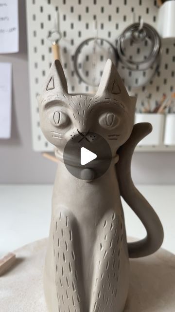 Dóttir Studio by Jess King on Instagram: "I love cats and cats love me back. *sound on* 😆   This is a new candle holder design I’ve been working on. I’d planned it half the size but it took on a life of it’s own ✨   It feels good to have my hands in clay again now I have my days back✨ . . . . . . . #dottirstudio #greenware #catsofinstagram #handmadeceramics #handmade #catstagram #ceramicanimals #ceramics #ceramicsofinstagram #ceramilicious #potterylove #workinprogress #makersgonnamake #catlover #potteryforall #ceramicart #contemporaryceramics #cerámica #homedecor #whimsicalart #animalart" Ceramic Cats Pottery, Cat Ceramic Ideas, Greenware Ceramics, Candle Holder Clay, Cat Ceramics, Love Me Back, Cat Candle Holder, Cat Candle, I Love Cats