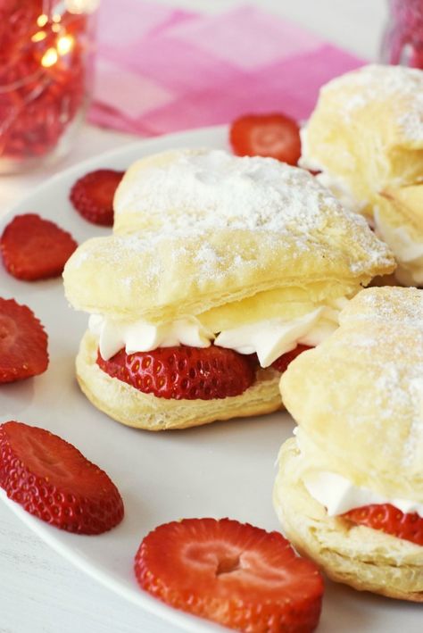 Looking for a deliciously sweet Valentine's Day dessert? These Valentine treats are just as pretty as they are yummy. Share them with a special someone, make some for a teacher gift or just enjoy a few of these pretty desserts while celebrating Valentine's Day with your family! Date Night In Ideas, Night In Ideas, Strawberry Cream Puffs, Romantic Desserts, Puff Pastry Filling, Cream Puff Recipe, Puff Recipe, Valentine Desserts, Valentines Day Desserts