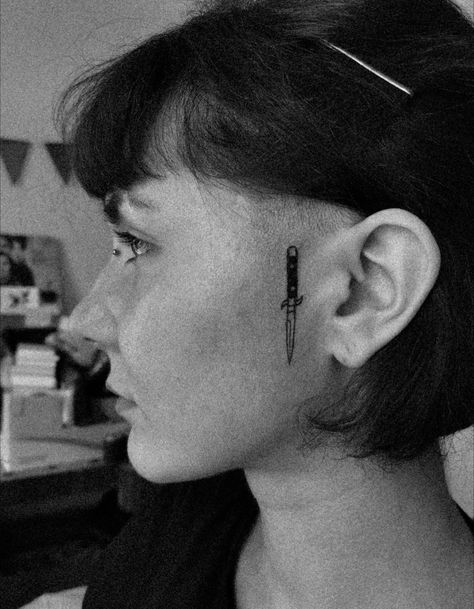 Grunge Face Tattoos, Knife Tattoo Behind Ear, Face Tattoo Near Ear, Knife Behind Ear Tattoo, Face Tattoo By Ear, Next To Ear Face Tattoo, Unique Face Tattoos, Face Tattoo Women, Ear Face Tattoo