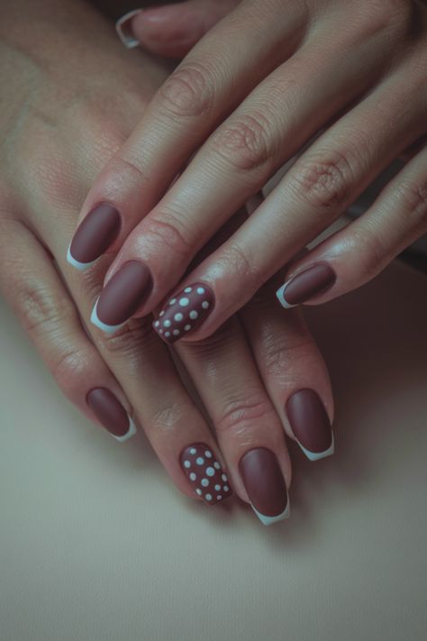 Upgrade your fall look with these stunning brown nails, featuring elegant white tips and playful polka dot accents. This trendy nail design is perfect for the fashion-forward, bringing a fresh twist to classic autumn nail ideas. Whether you're dressing up or keeping it casual, these nails add a touch of chic sophistication to any fall outfit! Nails With Polka Dots, Autumn Nail Ideas, Brown Fall Nails, White Tips, Autumn Nail, Autumn Design, Vibrant Nails, Brown Fall, White Tip