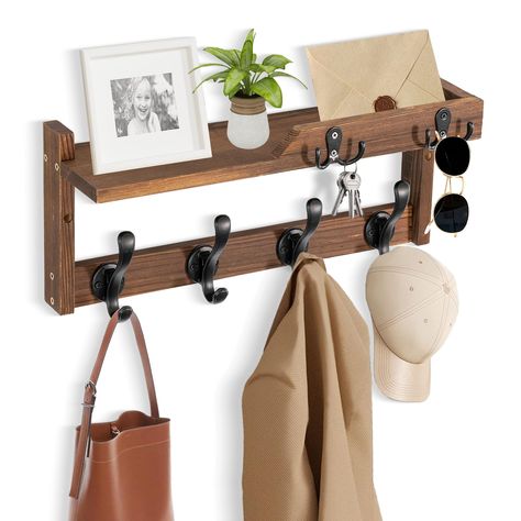 PRICES MAY VARY. PRACTICAL AND STYLISH: The appearance design of this wall-mounted coat rack is both fashionable and practical, and has applied for an appearance patent; It makes full use of the wall space at the entrance, can be matched with various decoration styles, adding an elegant touch to your space 4-IN-1 FUNCTION: It is not only a coat rack, but also a key holder and mail organizer, and it is also a storage and display wall shelf; You no longer have to worry about forgetting things when