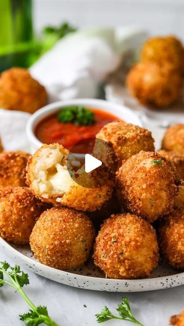 Samantha Merritt on Instagram: "Arancini, aka Sicilian fried rice balls, are a quintessential Italian street food. If you’ve never had them, you’re in for a treat! The outside is golden-crisp, and the interior is soft with pearly risotto and a melty mozzarella core. Serve them with a side of marinara sauce for that classic flavor!  These rice balls are super versatile and adaptable; you can dress things up by adding some garlic in with the onion, or add ham or peas to the filling (you can even skip the mozzarella). I like this more basic but super flavorful version, though.   I am so excited for you to try this one! For the recipe, comment “recipe” below or find it here (clickable link in bio): https://sugarspunrun.com/arancini/   #recipeoftheday #appetizer #riceballs #Arancini #italiandis Easy Arancini Balls, Arancini Balls Recipes, Fried Rice Balls, Arancini Balls, Italian Street Food, Italian Street, The Onion, Rice Balls, Balls Recipe