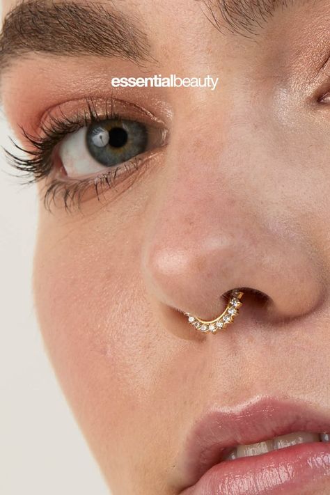 A woman with a septum piercing, in her septum piercing she wears our 24K Gold PVD SS316L Surgical Steel Jewelled Septum Clicker. Round Septum Piercing, Elegant Septum Piercing, Septum Piercing Jewelry Gold, Septum Piercing Gold, Septum Piercing Rings, Gold Septum Piercing, Septum Gold, Septum Nose Piercing, Gold Septum Ring