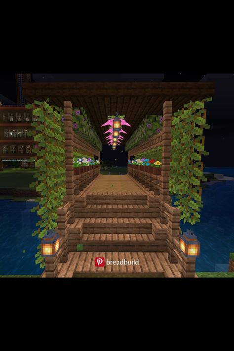 This Minecraft bridge is made of wood and lots of plants. This is after the Minecraft 1.17 Cave Update, Glow Berry and Spore Blossom were added. Spore Blossom In Minecraft, Minecraft Glow Berries Ideas, Cherry Blossom Wood Minecraft, Minecraft Glow Berries Farm, Minecraft Cherry Blossom Bridge, Cherry Blossom Bridge Minecraft, Cute Things To Build In Minecraft, Minecraft Cherry Blossom, Minecraft Bridge