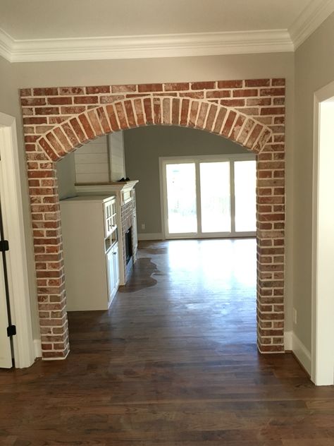 Brick Wall Arch, Brick Arch Doorway, Brick Archway In Kitchen, Brick Doorway, New Orleans Style Homes, Archways In Homes, Brick Archway, Brick Interior Wall, Arch Doorway