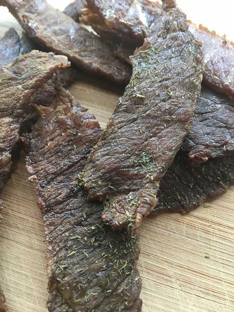 Dill pickle beef jerky! Don’t knock it before you try it! 🤤🥒  Recipes is for 2 lbs of meat 2 cups pickle juice Teaspoon onion salt Teaspoon garlic salt Tablespoon dill 4 cranks of salt 2 cranks of black pepper 1/2 c Worcestershire sauce  Marinate for 24 hours  Dehydrate for 5-6 hours in dehydrator. Ground Beef Jerky Recipe, Beef Jerky Recipe Dehydrator, Homemade Beef Jerky Recipe, Jerky Recipes Dehydrator, Jerkey Recipes, Smoked Jerky, Smoked Beef Jerky, Homemade Beef Jerky, Pepper Beef