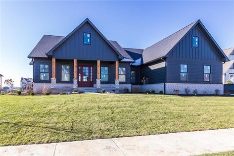 Dark Blue Hardy Board House, Dark Blue Board And Batten Exterior, Blue Metal House Exterior, Dark Blue Exterior House, Blue Barndominium Exterior, Dark Blue House Exterior With Wood, Dark Blue Exterior House Colors, Navy Blue House Exterior, Blue Exterior House Colors