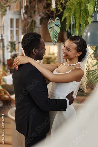 Stock Image: Vertical portrait of young black couple getting married and dancing together in room full of flowers and plants Room Full Of Flowers, Black Love Wedding, Young Black Couples, Couple Getting Married, Dancing Together, Relationship Pics, Black Couple, Romantic Wedding Photos, Young Black