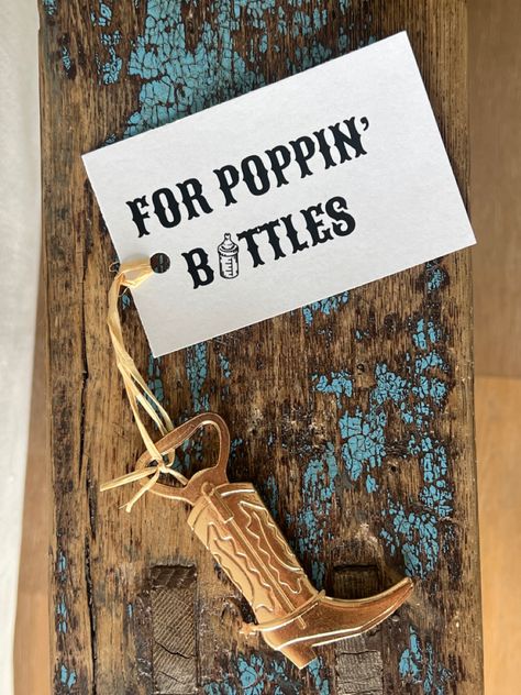 Country Theme Table Decorations, Cowboy Boot Bottle Opener, Boots And Bottles Party, Boots And Bowties Theme Party Ideas, Cowboy Baby Shower Gift Ideas, Western Fall Baby Shower Ideas, Neutral Cowboy Party, A Little Cowboy Is On His Way Decor, This Ain’t Her First Rodeo Baby Sprinkle