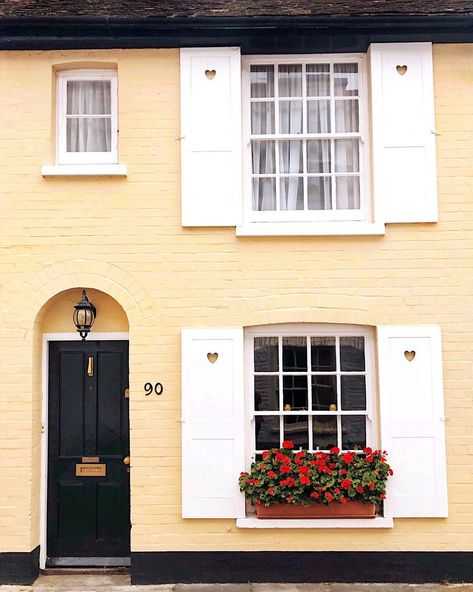 Yellow House With White Shutters, Light Yellow House, Yellow House Exterior, Painting Shutters, White Shutters, House Shutters, Happy Yellow, Stucco Exterior, Rural House