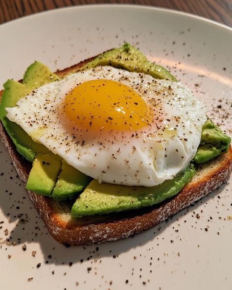 I'm so happy to share my favorite breakfast! This avocado toast topped with a poached egg is so good, it makes my mornings brighter! It's simple yet delicious, and it always gets my family asking for more!  Ingredients: - Ripe avocado - Fresh bread (like sourdough or whole grain) - Eggs  For the full recipe and more tips, check the link in first comment [👇] [👇]  Imagine creamy avocado on warm, crispy bread with a perfectly poached egg on top—what's not to love? Give it a try, and I bet you’ll agree!  #AvocadoToast #BreakfastGoals #HealthyEating #Yummy #Foodie Avacodo Toast Recipes Breakfast, Avocado Egg Sandwich, Egg And Avocado Toast, Avocado Scrambled Eggs, Breakfast Avocado Toast, Avocado Egg Toast, Avocado Toast With Egg, Field Meals, Avocado Toast Breakfast