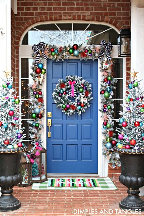 15 fun and festive Christmas porch decorating ideas! Come get inspired with these unique ideas. Everything from farmhouse to traditional and even colorful front porch christmas ideas! #christmas #frontporch #christmasdecor #porchdecor Outdoor Christmas Decorations Colorful, Colorful Christmas Outdoor Decorations, Colored Lights Outdoor Christmas, Outdoor Colored Christmas Lights, Colored Outdoor Christmas Lights, Colorful Outdoor Christmas Lights, Colorful Outdoor Christmas Decorations, Outdoor Christmas Decorations Ideas, Colorful Christmas Lights