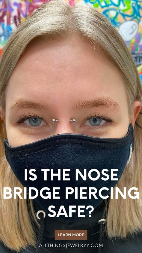 Are you curious about nose bridge piercings? Read this guide to learn what nose bridge piercings are, pain level, and healing time. Bridge Piercing On Big Nose, Bridge Piercing Video, Bridge Of Nose Piercing, Piercing Nose Bridge, Fake Bridge Piercing, Dainty Bridge Piercing, Nose Bridge Piercing Jewelry, Gold Bridge Piercing, Small Bridge Piercing