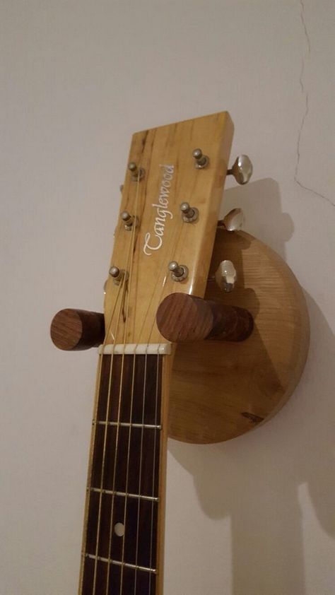 How to Build Your Guitar Hanger: Top 5 Things You Should Know Musician Decor, Guitar Wall Holder, Build Your Own Guitar, Guitar Hook, Guitar Holder, Guitar Wall Hanger, Making Musical Instruments, Guitar Display, Diy Guitar