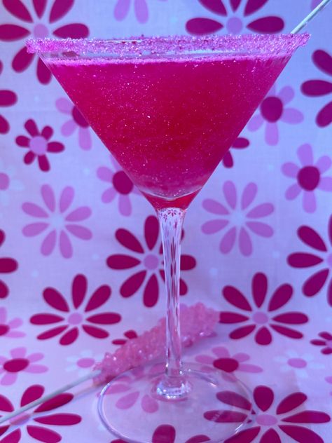 Pink Barbietini cocktail and mocktail recipe Y2k Party Drinks, Y2k Drinks, Pink Glitter Cocktail, Ruth Handler, Rock Candy Sticks, Pink Dragon Fruit, Barbie Theme Party, Honey Pink, Strawberry Vodka