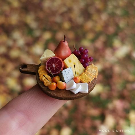 Little cheese boards . . . . . . #polymerclay #polymerclaycheese #miniature #miniaturefood #cheeseboard #cheeseandcrackers #mini #autumn Mini Foods Clay, Miniature Fridge, Clay Diys, Miniture Food, Dollhouse Diy, Mini Stuff, Poly Clay, Cheese Boards, Tiny Food