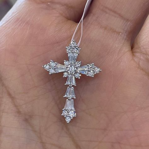 "Beautiful Diamond Cross Pendant set with baguette and round brilliant cut diamonds.  Good Quality Diamonds, no black carbon spot when viewed under a magnifying glass.  The diamonds are very sparkling.  Excellent craftsmanship, all diamonds are set nice and smooth.   Lays nicely on the neck, it won't flip around.  Not too big or small, just the right size.   Cross measures about  23.8 x 16.8.  Strong white gold link chain shown available for purchase.  Available in 18K white and yellow gold.  Genuine Round Brilliant Cut Diamonds Total weight: 0.70 Carats  Baguettes: 0.31 carats  Rounds: 0.39 carats Clarity: VS/SI Color: F Solid 18K white gold 1.72 grams  14K white gold chain 1.95 grams 18\" Comes with gift box * We have been in the wholesale Jewelry business for over 30 years serving the c Beautiful Cross Necklace, Cross Diamond Necklace, Cross Neckless, Diamond Cross Necklace, Catholic Cross, Expensive Jewelry Luxury, Diamond Cross Necklaces, Gold Link Chain, Gold Link