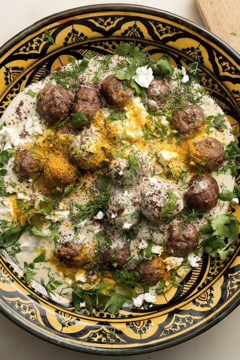 These spice-loaded meatballs have a Turkish inflection The warm yogurt sauce adds tang and richness, along with a sprinkling of tart sumac powder and chopped mint American "Greek-style" yogurt is not always tart enough, but it can be thinned with a bit of buttermilk or even lemon juice Minced Lamb Recipes, Iberian Recipes, Nytimes Cooking, Lamb Mince Recipes, Sumac Powder, Spiced Meatballs, Turkish Meatballs, Sumac Recipes, Lamb Meatballs Greek