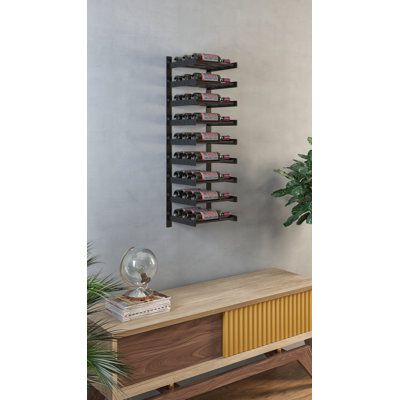 Prep & Savour’s Abbie-May Wine Wall system is a modular wine rack that blends contemporary label-forward design with smart functionality perfect for home and commercial wall-mounted storage projects, small to large. This stylish system uses steel Wine Rods to hold standard, Champagne or Pinot Noir — all in the same row. Prep & Savour’s proprietary design allows for sturdy installation — using commercial-strength steel supports — into both drywall and wood-backed surfaces. Perfect for your everyd Mounted Wine Rack, Wall Mounted Wine Rack, Wine Bottle Rack, Wine Wall, Bottle Wall, Bottle Rack, Wall Systems, Large Homes, Pinot Noir