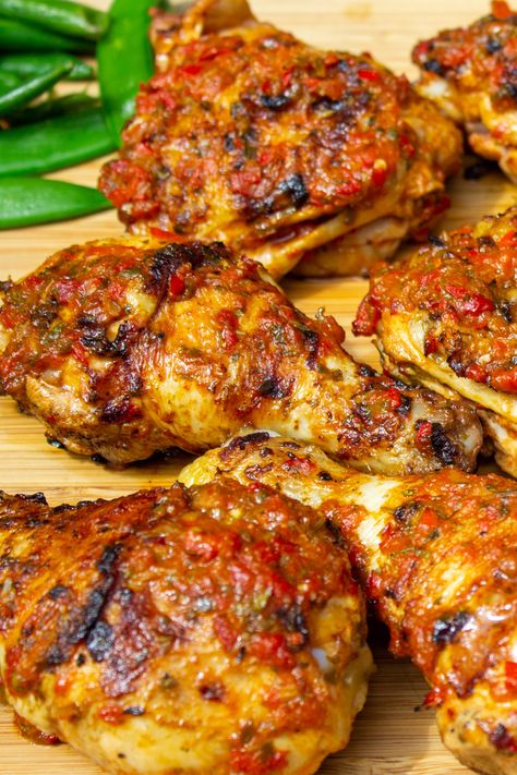 Succulent peri peri chicken, inspired by Portuguese-African cuisine, is elevated to a whole new level with its tangy-spicy sauce. It's a must-try if you love bold and unique flavors. Make is as spicy or mild as you like. African Chicken Recipes, Peri Chicken Recipe, Unique Chicken Recipes, Crock Pot Chicken Recipe, Peri Peri Chicken Recipe, Continental Cuisine, Easy Crock Pot Chicken, Chicken Barbecue, Steak Kebabs