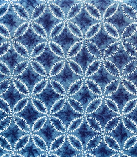 Lightweight cotton fabric features printed Shibori tie-dye with shippo pattern (七宝 overlapping circles) in indigo color.   Suitable for quilting, accessories, garments and crafts.     PLEASE NOTE that this is a printed fabric which has been created to imitate the Japanese traditional Shibori (tie-dye) technique. Please note that this is NOT a genuine indigo Shibori tie-dye fabric. Please change the quantity in the drop down menu or in your shipping cart if you would like continuous yardage. For Tie Dye Garments, Quilting Accessories, Overlapping Circles, Japanese Shibori, Shibori Techniques, Shibori Pattern, Indigo Tie Dye, Indigo Color, Shibori Dye